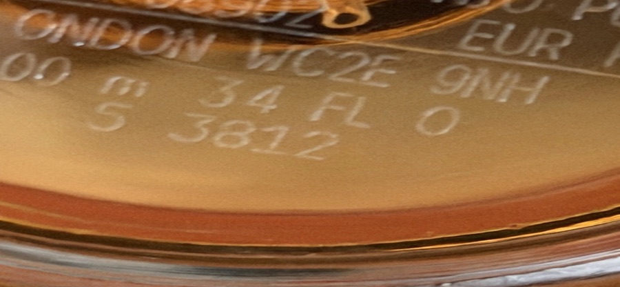 Where to find the code on Carolina Herrera packaging — 2. Original Carolina Herrera product package reference showing where to find the batch code for manufacture-date and expiration-date lookup.